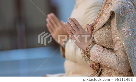 Pray of woman on ceremony of Buddhist in Thailand. Pray of woman on ceremony of Buddhist in Thailand. 96111498