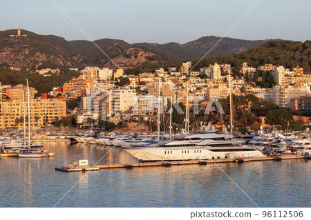 Boats in a Marina with Downtown City Buildings by Balearic Sea. Palma, Balearic Islands, Spain. Boats in a Marina with Downtown City Buildings by Balearic Sea. Palma, Balearic Islands, Spain. 96112506