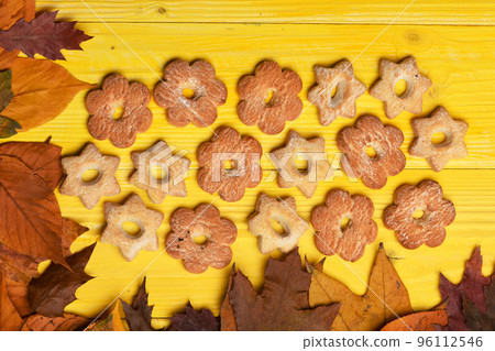 Pastry and homemade goods concept. Flowers and stars cookies Pastry and homemade goods concept. Flowers and stars cookies 96112546