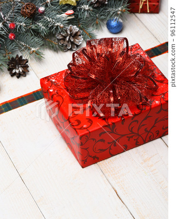Composition of Christmas gift and tree decor. Winter time Composition of Christmas gift and tree decor. Winter time 96112547