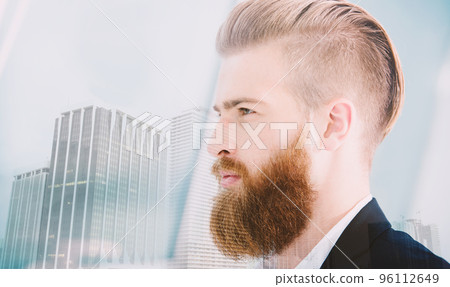 Businessman looks far for the future. Concept of innovation and startup. double exposure Businessman looks far for the future. Concept of innovation and startup. double exposure 96112649
