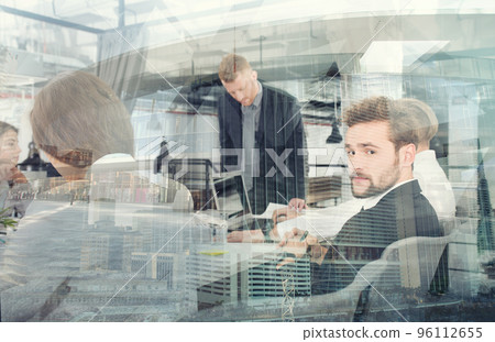 Businessmen that work together in office. Concept of teamwork and partnership. double exposure 96112655