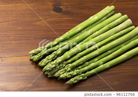 green asparagus on a plate green asparagus on a plate 96112708