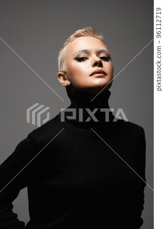 portrait of Short Hair Beautiful young woman. sensual girl with make-up and blond Hair portrait of Short Hair Beautiful young woman. sensual girl with make-up and blond Hair 96112719