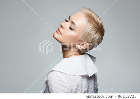 Short Hair Beautiful young woman. sensual girl with make-up and blond Hair Short Hair Beautiful young woman. sensual girl with make-up and blond Hair 96112723