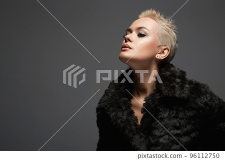 young short blond hair woman in fur. beautiful girl 96112750