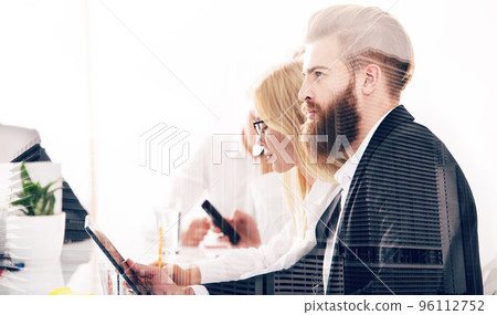 Businessman in office connected to internet network. concept of startup company. double exposure 96112752