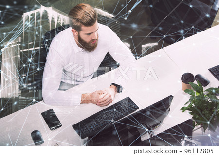 Businessman in office connected on internet network. concept of startup company. double exposure 96112805