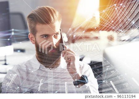 Businessman talking to the phone in office with internet network effects. double exposure 96113194
