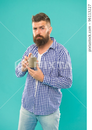 something really powerful. brutal bearded hipster with masculine perfume. man hold bottle of perfume 96113227