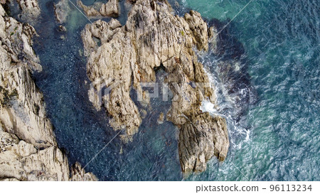 A lot of boulders in the sea water. Coastal cliffs of the North Atlantic. Seaside beautiful nature. Dramatic seascape of the north of Europe. A lot of boulders in the sea water. Coastal cliffs of the North Atlantic. Seaside beautiful nature. Dramatic seascape of the north of Europe. 96113234