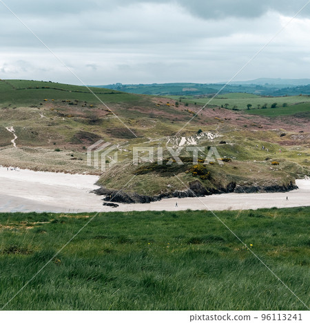 Picturesque hills. Cloudy rainy weather. Landscapes along the Wild Atlantic Way. Nature of Northwestern Europe. Beautiful places of Ireland. 96113241