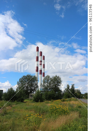 striped chimneys of thermal power plant rural landscape 96113546