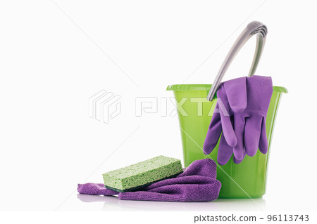 Household Cleaner tools and sundry items Spring cleaning kitchen, bathroom and other rooms. on white. Cleaning and janitorial service concept. Green and vibrant violet. Bucket with gloves and dusters Household Cleaner tools and sundry items Spring cleaning kitchen, bathroom and other rooms. on white. Cleaning and janitorial service concept. Green and vibrant violet. Bucket with gloves and dusters 96113743