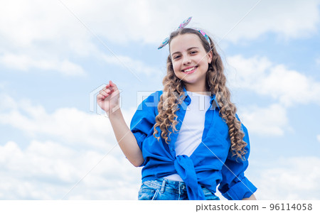 happy kid wearing casual checkered shirt on sky background, vintage style happy kid wearing casual checkered shirt on sky background, vintage style 96114058