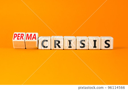 Permacrisis or crisis symbol. Concept words Crisis and Permacrisis on wooden cubes. Beautiful orange table orange background. Business permacrisis or crisis concept. Copy space. 96114566