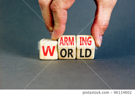 Warming world symbol. Concept words Warming world on wooden cubes. Beautiful grey table grey background. Businessman hand. Business, ecological and warming world concept. Copy space. 96114602