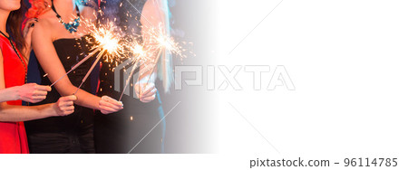 Banner New year party, celebration and holidays concept - group of friends having fun with sparklers copy space Banner New year party, celebration and holidays concept - group of friends having fun with sparklers copy space 96114785