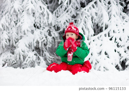 Boy on sleigh ride. Child sledding. Kid with sledge Boy on sleigh ride. Child sledding. Kid with sledge 96115133