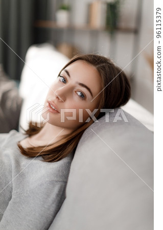 Woman resting at home 96115379