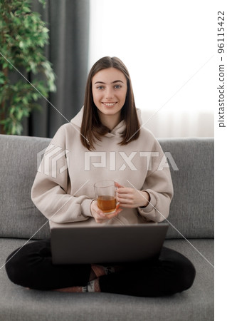 Freelancer with laptop at home 96115422