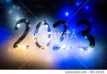 Background of misted glass. Christmas lights 96116026
