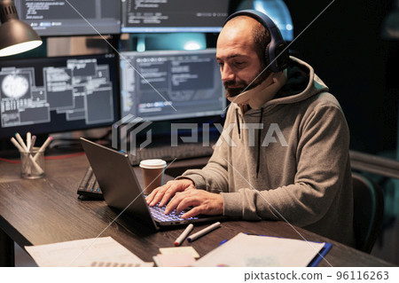 Web developer with medical neck brace working on coding, using source code to develop new user interface. Being in pain after vertebra injury, wearing cervical collar foam in office. Web developer with medical neck brace working on coding, using source code to develop new user interface. Being in pain after vertebra injury, wearing cervical collar foam in office. 96116263