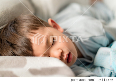 Child sleeping in bed Sleep image Child sleeping in bed Sleep image 96117376