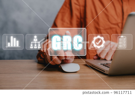 GRC, Governance Risk and Compliance concept, Business person using laptop computer and hand touching GRC icon on vr screen, Risk Management and Compliance procedures and processes. GRC, Governance Risk and Compliance concept, Business person using laptop computer and hand touching GRC icon on vr screen, Risk Management and Compliance procedures and processes. 96117711
