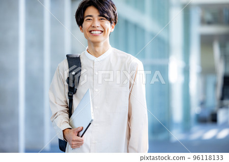 College student walking on campus College student walking on campus 96118133
