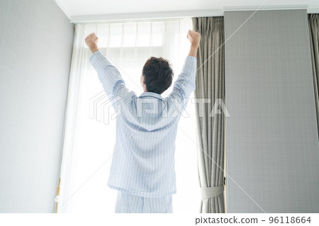 A man in his 40s in the bedroom 96118664