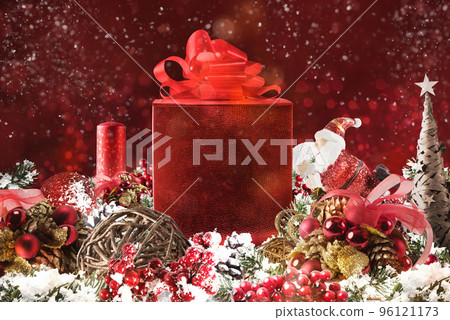 Christmas background concept. Shimmering Christmas decorations with gift, tree, Santa Claus and candles Christmas background concept. Shimmering Christmas decorations with gift, tree, Santa Claus and candles 96121173