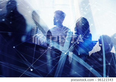 Silhouette of business people work together in office. Concept of teamwork and partnership. double exposure with network effects Silhouette of business people work together in office. Concept of teamwork and partnership. double exposure with network effects 96121543