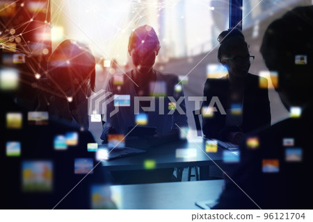 Business people work together in office. Concept of teamwork and partnership. double exposure with network effects 96121704