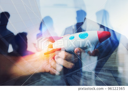 Businessman launches his startup company. Hand holding a wooden rocket. double exposure with light effects 96122365