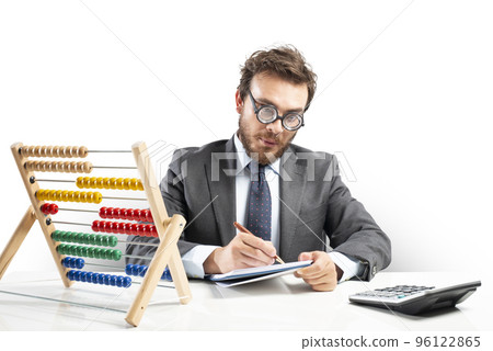 Nerd accountant does calculation of company revenue Nerd accountant does calculation of company revenue 96122865