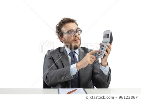 Nerd accountant does calculation of company revenue 96122867