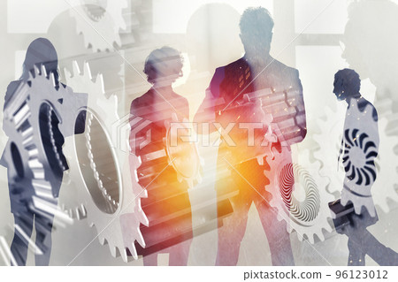 Business team with gears system. Teamwork, partnership and integration concept. double exposure 96123012