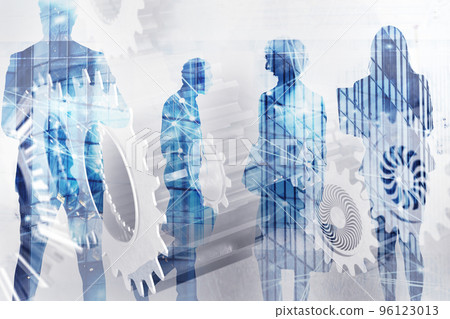Business team with gears system. Teamwork, partnership and integration concept with network effect. double exposure 96123013
