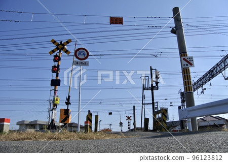 A small railroad crossing on a local railway line 96123812