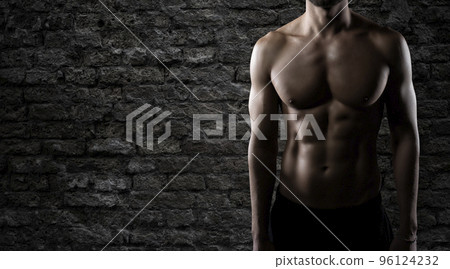 Muscular of a body building trainer man 96124232