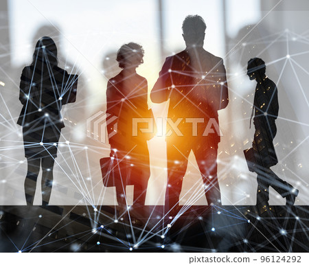 Business people work together in office with internet network effects. Concept of teamwork and partnership. double exposure Business people work together in office with internet network effects. Concept of teamwork and partnership. double exposure 96124292