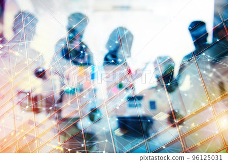 Business people work together in office with internet network effects. Concept of teamwork and partnership. double exposure 96125031
