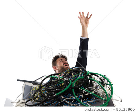 Businessman trapped by cables. concept of stress and overwork 96125900