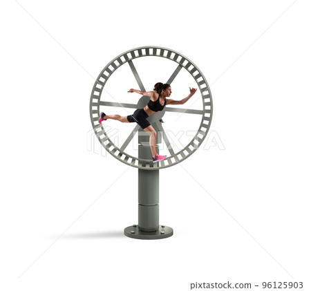 Athletic woman runs in a looping wheel. concept of sport routine 96125903