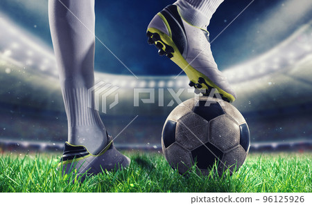 Soccer player with soccerball at the stadium ready for the match 96125926