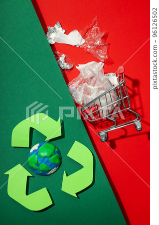 Concept of Save the world and Recycling on two tone background 96126502