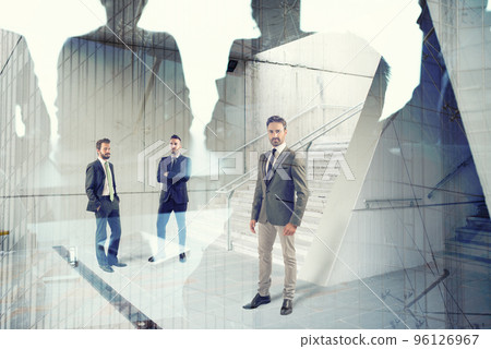 Businessmen that work together in office. Concept of teamwork and partnership 96126967