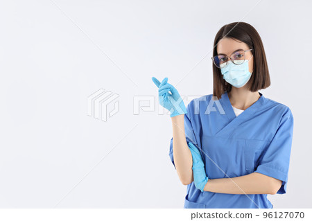 Concept of profession, young female doctor on light background 96127070
