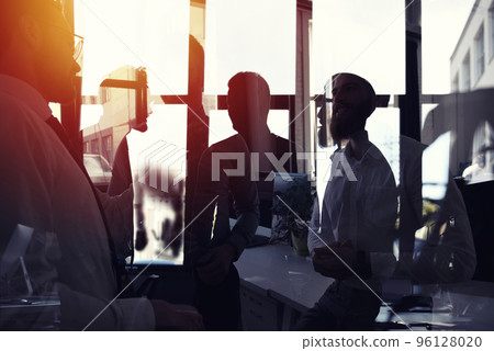 Businessmen that work together in office. Concept of teamwork and partnership 96128020